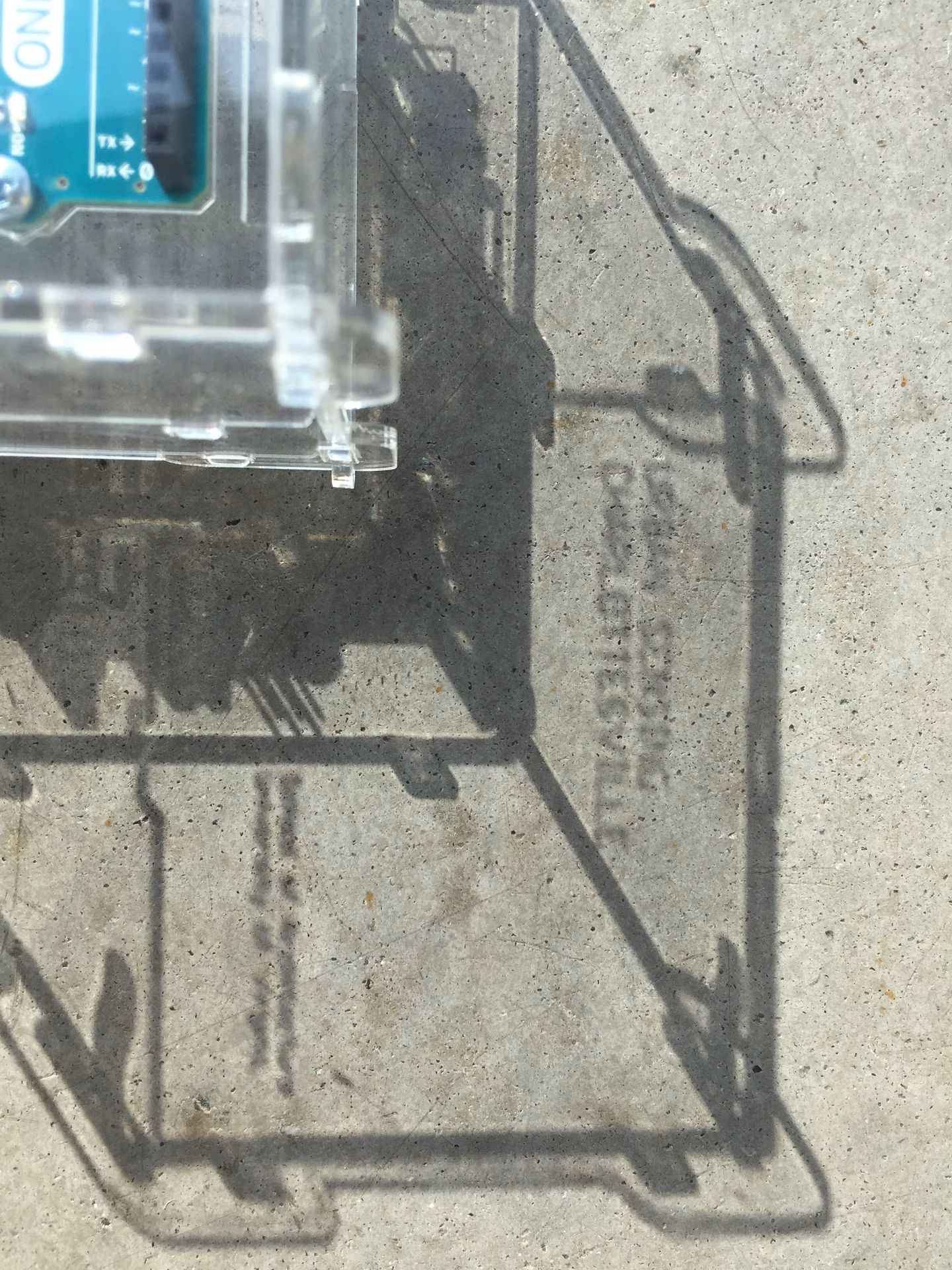 Sensing device deployed on pavement