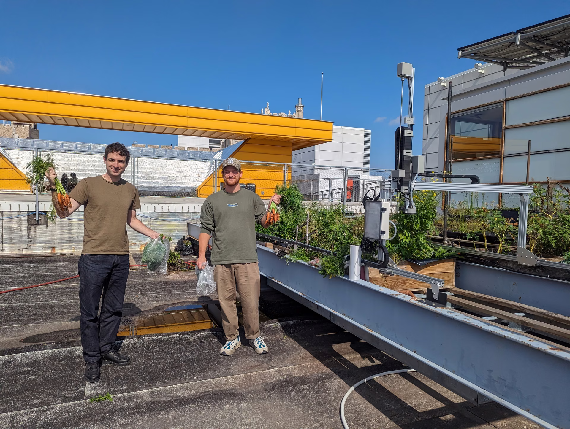 Two of the team walking the roof