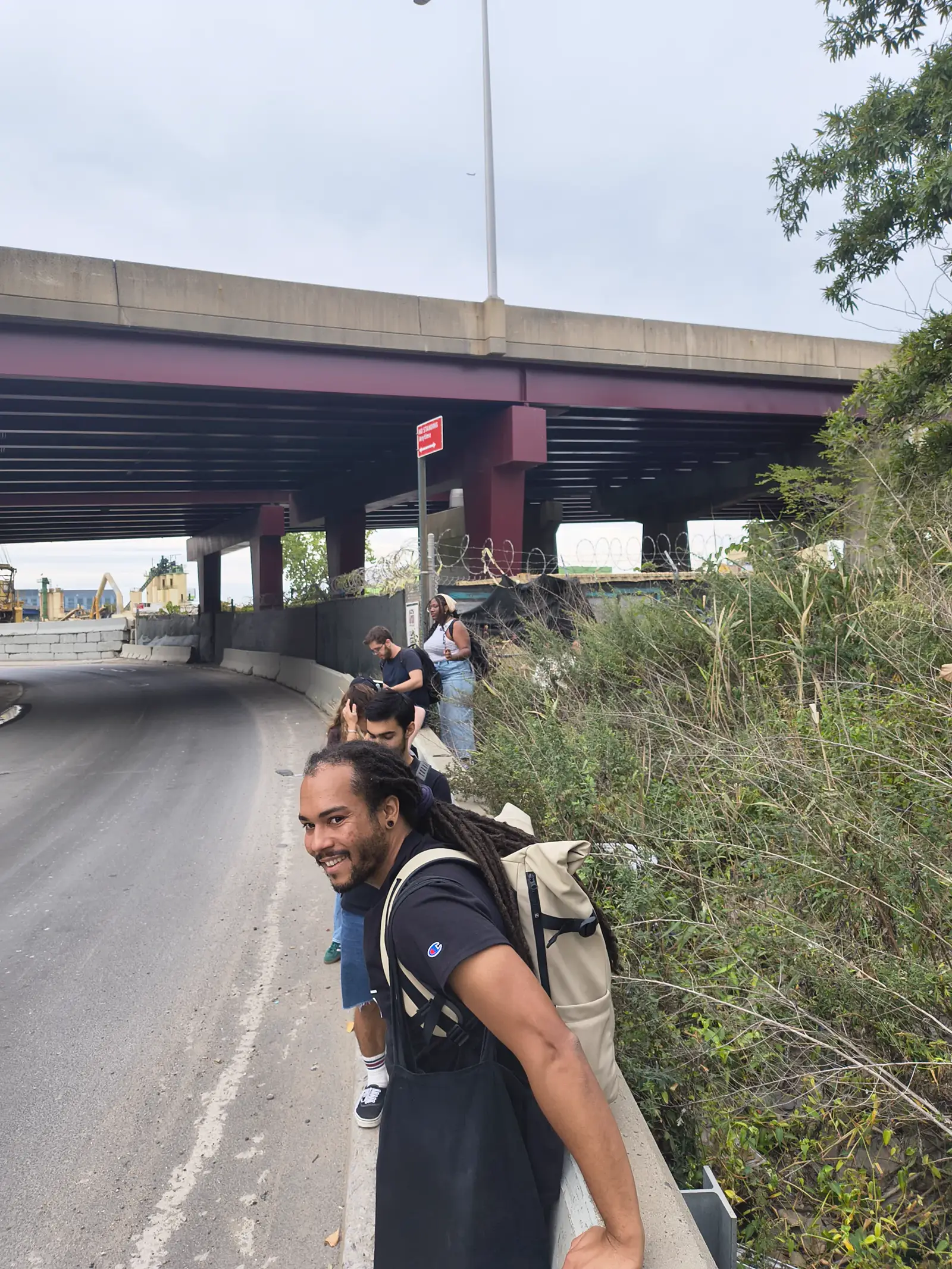 Students walking along the Van Wyck Expressway