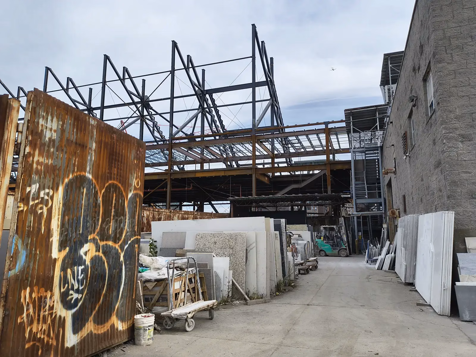 Salvage yard structures and fencing at Willets Point